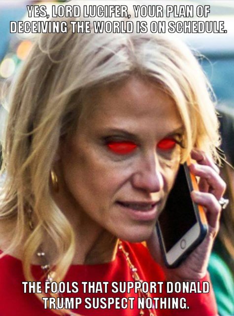 Kellyanne Conway is talking on her phone outside. Her eyes have been altered appears red. Text at the top reads “Yes, Lord Lucifer, your plan of deceiving the world is on schedule.” Text at the bottom reads “The fools that support Donald Trump suspect nothing.”